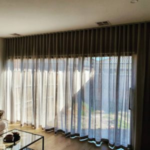 Wall to wall, floor to ceiling sfold motorized curtains